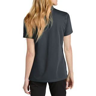 The back of a woman with long strawberry blonde hair wearing a solid dark gray Nike polo.