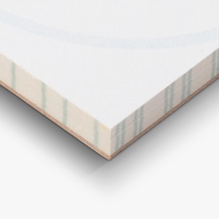 The bottom corner of a custom notepad printed with white pages and light green lines on the sides.
