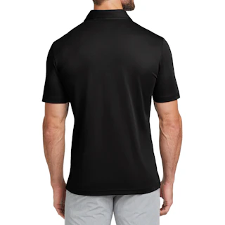 The back of a man wearing a company polo shirt in solid black with light gray pants.