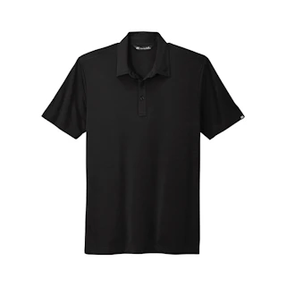 A solid black custom polo business shirt with a white logo tag on the left sleeve.