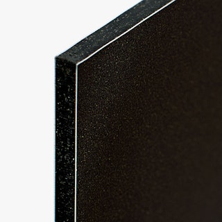 The top corner of a custom aluminum sign printed in solid black with a slim white border.