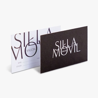 Two appointment cards custom printed with Silla Movil Salon and lines for appointment information.