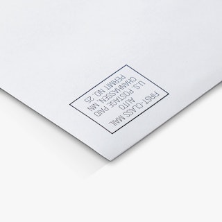 The top right corner of a business envelope printed with first-class mail postage indicia.