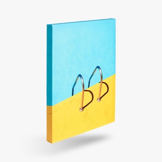 A canvas print printed with a yellow and blue background and two metal railings.