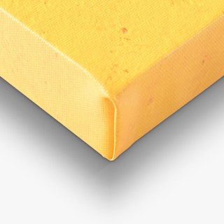 The corner of a custom canvas print with a solid yellow background.