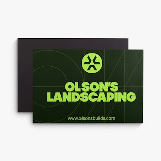 Two car magnets overlapping each other and printed with Olson's Landscaping in black and lime green.