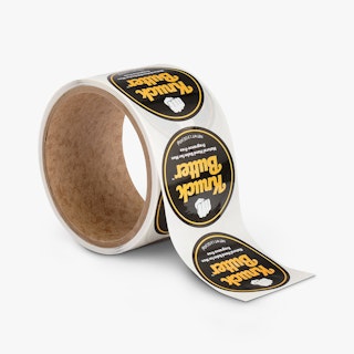 Custom roll labels printed with a circular shape and Knuck Butter in yellow, white and black.