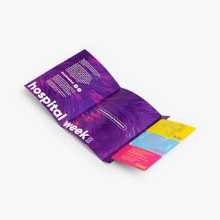 An unfolded coupon mailer with three perforated direct mail coupons in purple, yellow, blue and pink.