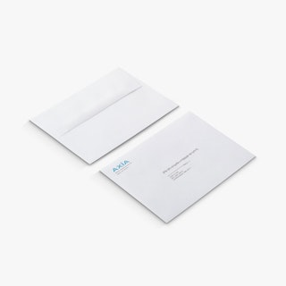 Two envelopes lined up and printed with AXIA in the top left corner and an address in the middle.