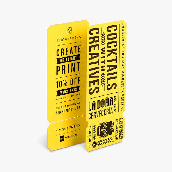 Two event tickets being torn apart at the perforation with a yellow and black skeleton design.