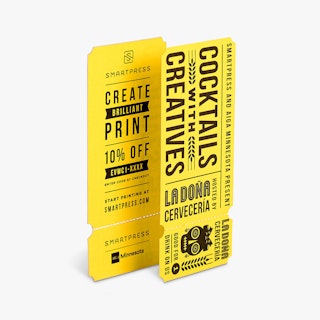Two event tickets being torn apart at the perforation with a yellow and black skeleton design.