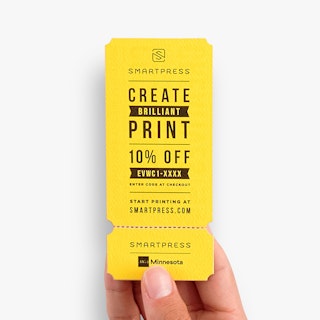 A hand holding a custom event ticket printed in yellow and black with Create Brilliant Print and 10% Off.