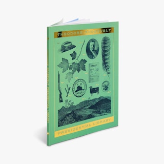 A perfect bound booklet printed with a green background and a cover with gold foil and Theodore Roosevelt-themed graphics.