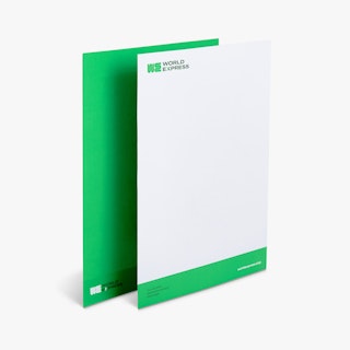 A custom letterhead printed with World Express overlapping another letterhead with a green background.