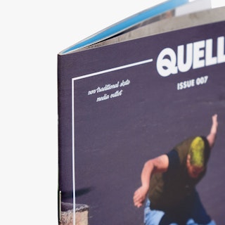 The top left corner of a custom magazine printed with Quell Issue 007 and a person skateboarding on the cover.