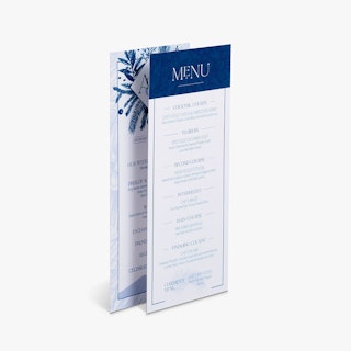 Two menu cards overlapping each other with a blue and white foliage design and menu items listed out.
