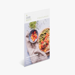 A custom menu insert printed with Good Roots Featured and an image of a harvest platter in two bowls.