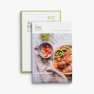 Two menu inserts overlapping each other and printed with Good Roots and an image of a harvest platter.
