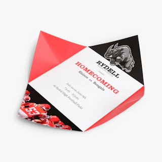 An unfolded modified corner fold mailer printed with a red and black design and homecoming details.