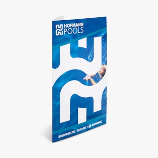 A marketing pamphlet standing open and printed with Hofman Pools in a blue and white design.