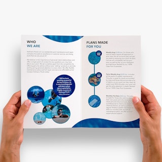 Two hands holding open a marketing pamphlet printed with service information for Hofmann Pools.