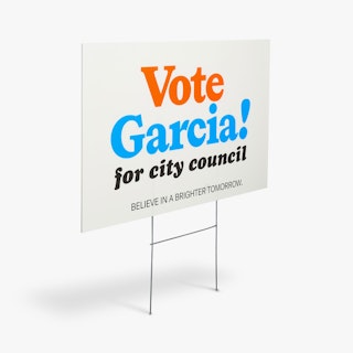 A political yard sign custom printed with Vote Garcia for City Council in orange, blue and black.