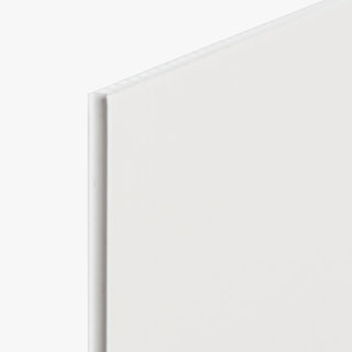 The top corner of a yard sign printed with a solid white background and white edge.