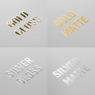 Four pieces of paper printed with raised foil text in gold gloss, gold matte, silver gloss and silver matte.