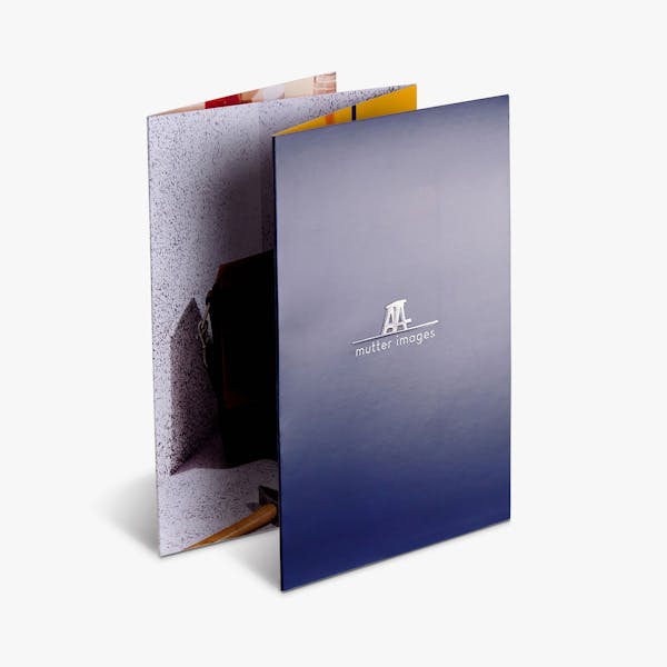A raised UV brochure with an accordion fold printed with Mutter Images on the front cover.
