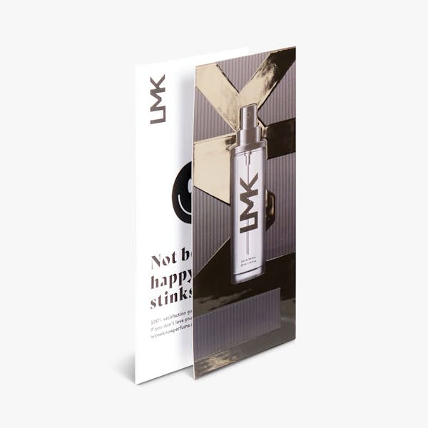 Two spot UV rack cards overlapping each other and printed with a fragrance bottle and messaging.