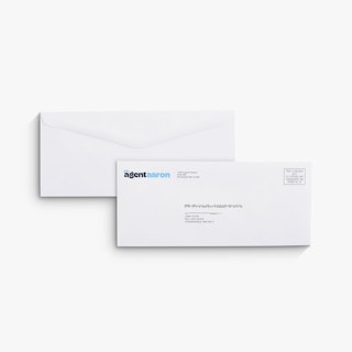 Two custom business envelopes overlapping each other and printed with Agent Aaron in the top left corner.