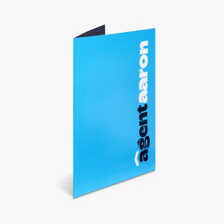 A real estate pocket folder printed with a solid blue cover and Agent Aaron in dark blue and white.