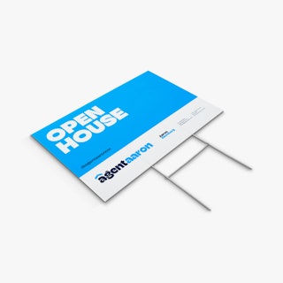 An open house yard sign laying flat with a blue and white design, Agent Aaron at the bottom and an H-stake.