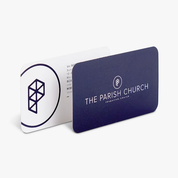 Two business cards overlapping each other and printed with The Parish Church and a dark blue background.