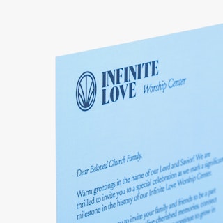The top left corner of a religious direct mail postcard printed with Infinite Love Worship Center.