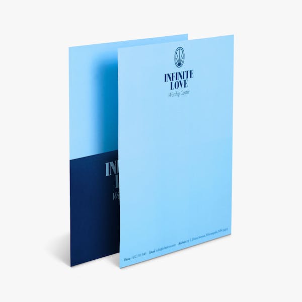 Two church letterheads overlapping each other and printed with a light blue and dark blue design.