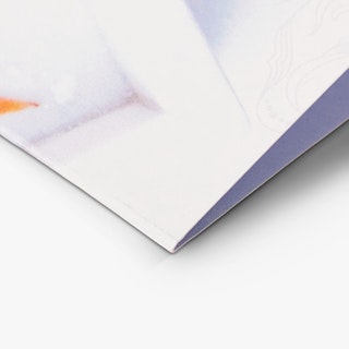 The bottom of a custom brochure printed with a light gray, pale blue and orange design.
