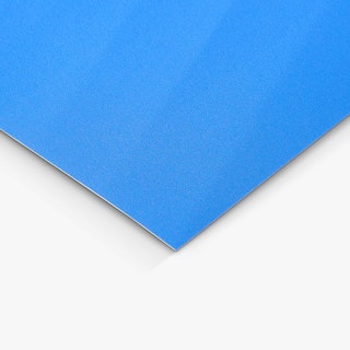 The bottom corner of a custom poster printed with a bright blue background.