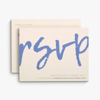 Two RSVP cards overlapping each other and printed with rsvp in blue on the front and guest details on the back.