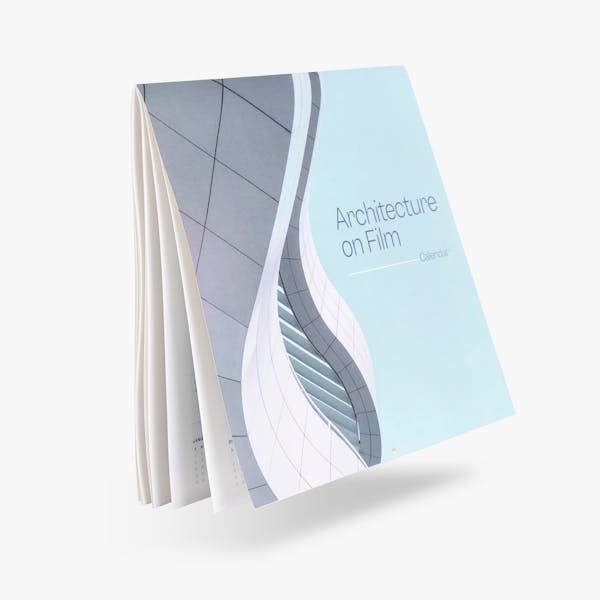 A wall calendar printed with a blue and gray design and Architecture on Film on the cover.