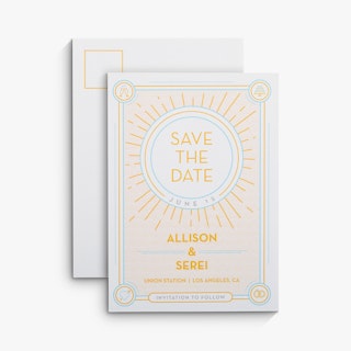 Two save the date postcards overlapping each other and custom printed with a blue and yellow design.