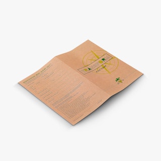 A custom brochure laying flat and printed with Transform Kids Camp and a registration form.