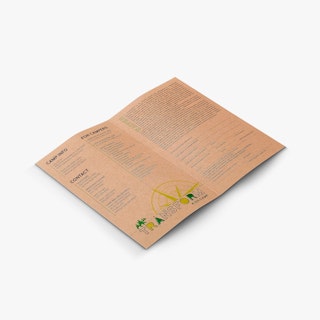 A bi-fold brochure laying open to details about a kids camp, contact information and a waiver.