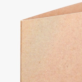 The top corner of a custom brochure printed on Kraft paper.