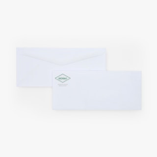 Two overlapping school business envelopes with a green and silver logo on the front and a blank flap on the back.