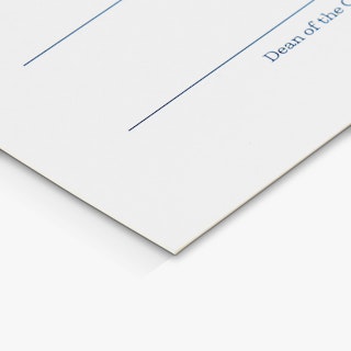 The bottom corner of a school certificate printed with a white background and black lines.