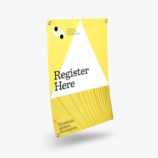 A school banner printed with grommets and Register Here in black, white and yellow.