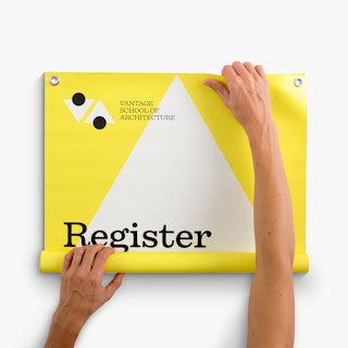 Two hands unrolling a hanging banner printed with Vantage School of Architecture in yellow, white and black.
