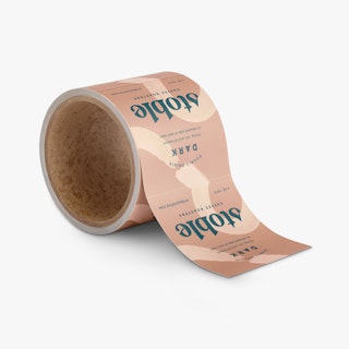 A roll of square labels printed with a dark tan and cream design and coffee bean details.