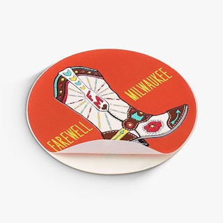 A custom sticker printed with an orange background and Farewell Milwaukee in yellow.